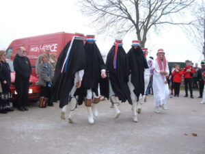 ...... to a bemused audience and a Parcel Force van ...