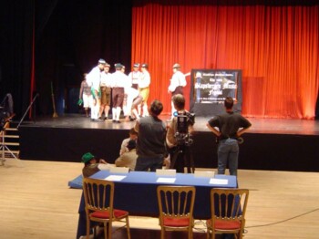 ..... to judge the 118th Slapsbergen Music Festival and find themselves ..... ..... to judge the 118th Slapsbergen Music Festival and find themselves .....