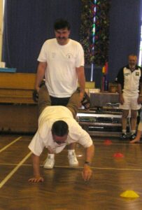 Paul and Lee show everyone how the wheelbarrow race should be done Paul and Lee show everyone how the wheelbarrow race should be done