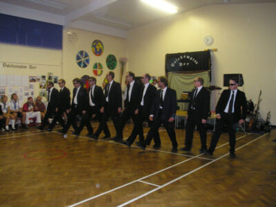 The boys in white turn into the Men in Black for their spot The boys in white turn into the Men in Black for their spot