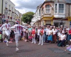 Coconutting in the Market Square Sidmouth 2007 - Sue and Bob
