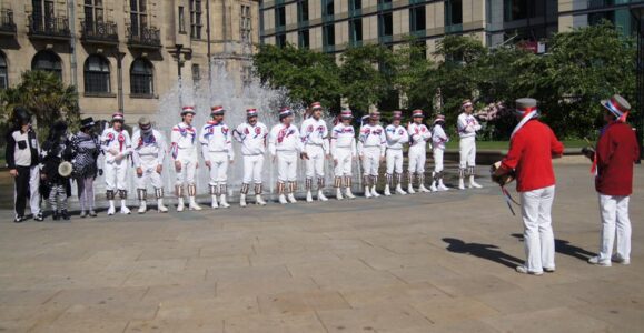 In the Peace Gardens, about to do Knees Up with some confused Pig Dyke members In the Peace Gardens, about to do Knees Up with some confused Pig Dyke members