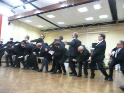 At the evening ceilidh with Stocai, the Men in Black reappear .... At the evening ceilidh with Stocai, the Men in Black reappear ....