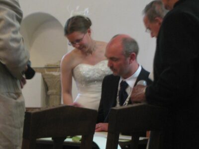 "Where do I sign, Em? Ah yes, under your thumb, good practice for the future" "Where do I sign, Em? Ah yes, under your thumb, good practice for the future"