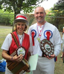 With their trophies. With their trophies.