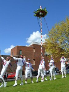 Coconuts round the Summerpole Coconuts round the Summerpole