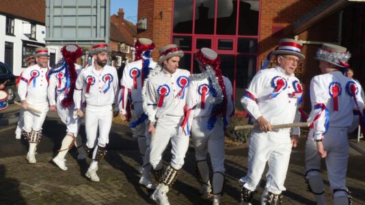 ... before moving across the road to dance outside the library... ... before moving across the road to dance outside the library...