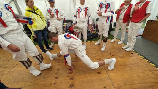 At the team reception, Rhys demonstrates his advanced warm ups